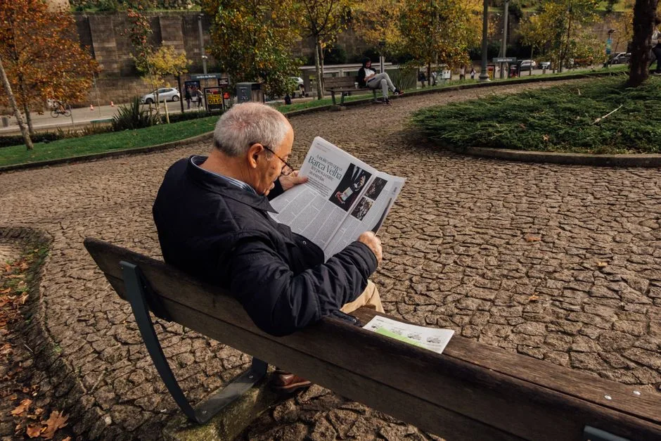 researcher reading old football newspaper Futebol Rio de Janeiro