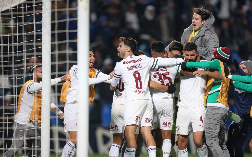 Jogadores do Fluminense comemorando a classificação às quartas da Libertadores