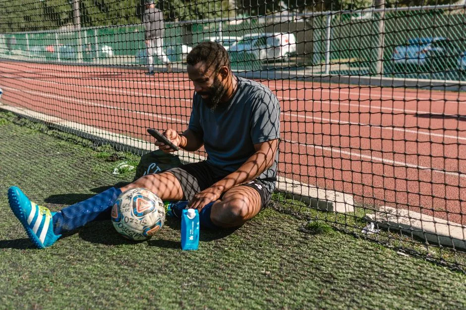 researcher photographing club ledger futebol