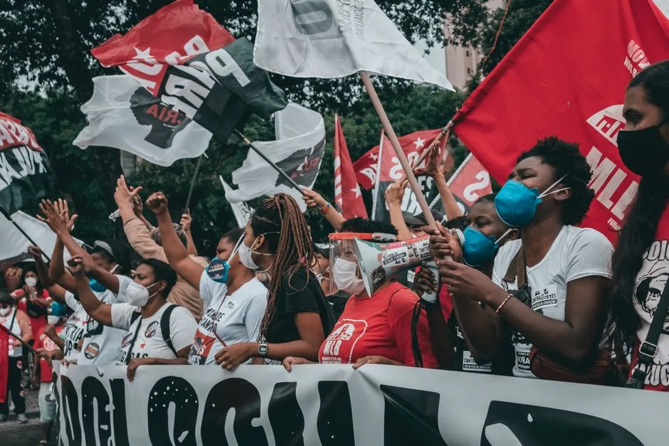 fans with black white banners Futebol Rio de Janeiro